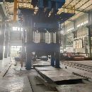 新定1600吨锻造油压机加15吨360度旋转操作机，